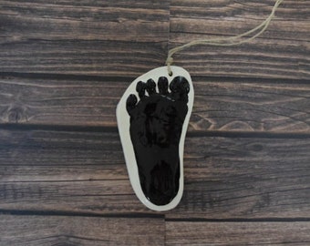 Newborn organic cut footprint ornament keepsake in black