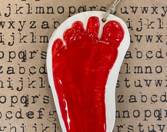 Newborn organic cut footprint ornament keepsake in red