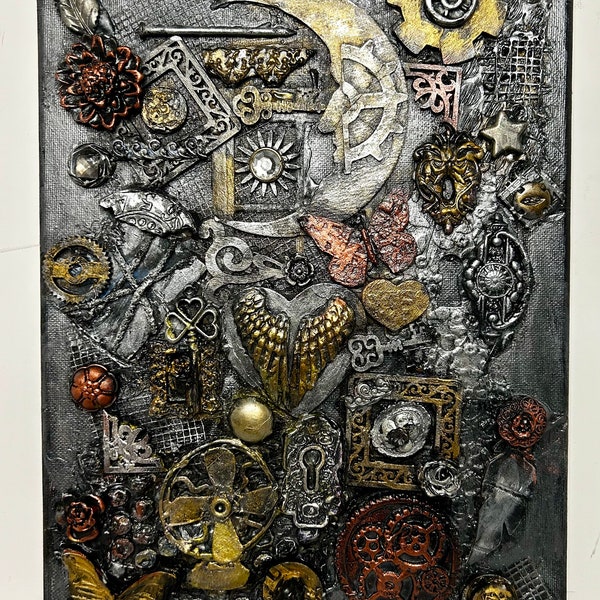 Steampunk Mixed Media Assemblage Art Canvas. It is titled “Found Objects”. A Steampunk Collage of Pipes, Gears, Keys, Moon and More!