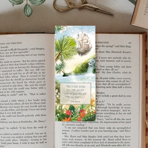 May include: A book bookmark with a watercolor illustration of a ship sailing on a blue ocean with a star and the text "Second Star to the Right and Straight On 'Til Morning."