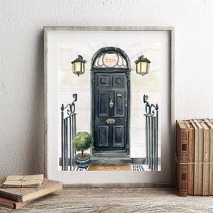 May include: A watercolor painting of a black door with a brass door knocker and the number "221B" above it. The door is framed by a white building with two black lanterns on either side. The door is set against a white background.