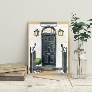 May include: A watercolor painting of a black door with a gold door knocker and the number 221B above it. The door is framed by two black gates and a potted plant. The painting is on a brown clipboard.