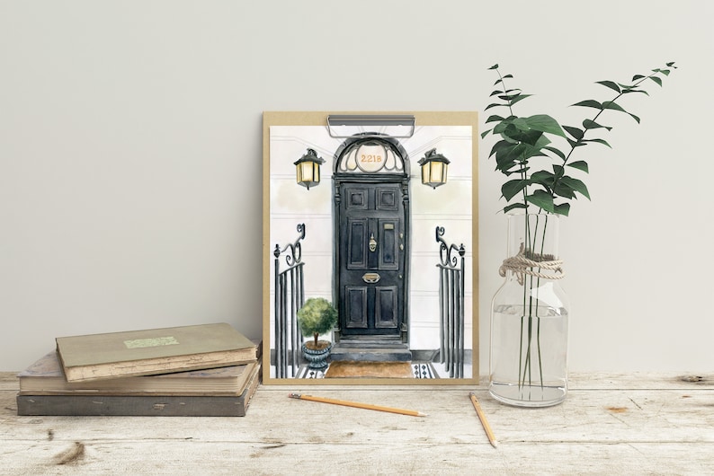 May include: A watercolor painting of a black door with a gold door knocker and the number 221B above it. The door is framed by two black gates and a potted plant. The painting is on a brown clipboard.