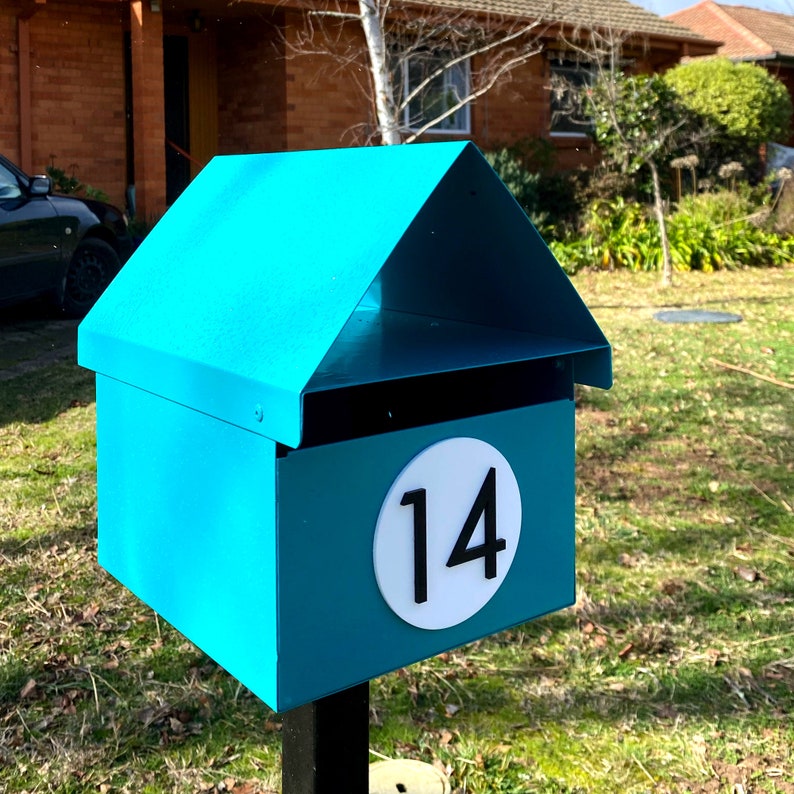 Custom mailbox and letterbox numbers cut from acrylic. Custom cut and made to order. High quality adhesive acrylic house numbers with disc for your mailbox. Minimalist and elegant styling to make identifying your house easy.
