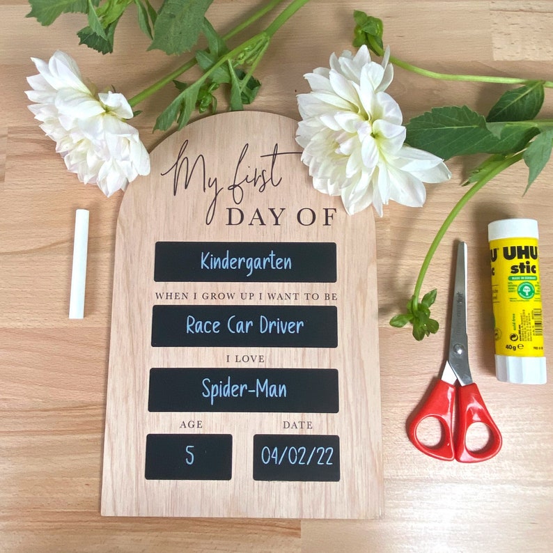 First day of school photo prop with chalkboard sections. Interactive back to school photo prop with chalkboard section for kids to fill in their details. Rustic wooden photo prop to look back on in the future