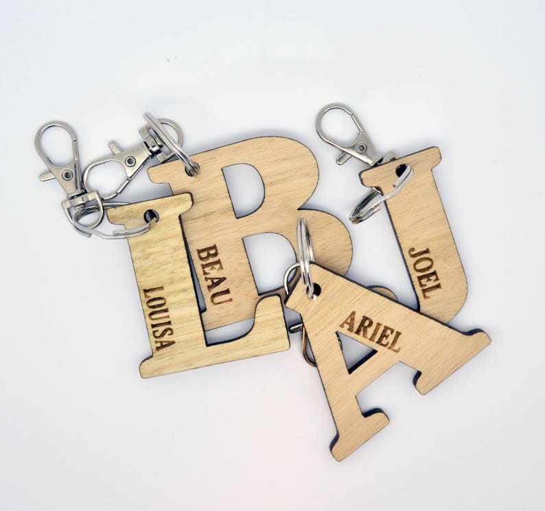 Personalised wooden kids name tags. Laser cut bag tag/ key ring for kids, daycare, preschool, nursery school bag. Custom alphabet key ring image 1