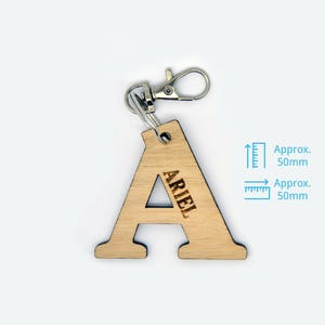 Personalised wooden kids name tags. Laser cut bag tag/ key ring for kids, daycare, preschool, nursery school bag. Custom alphabet key ring image 5