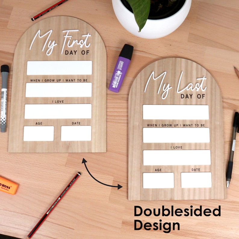 May include: Two wooden signs with a rounded top, one says "My First Day Of" and the other says "My Last Day Of". Each sign has blank spaces for writing in the details of a first or last day, such as age, date, and what the person wants to be when they grow up.
