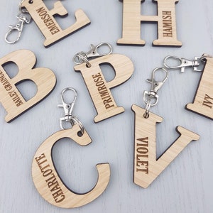 Personalised wooden kids name tags. Laser cut bag tag/ key ring for kids, daycare, preschool, nursery school bag. Custom alphabet key ring image 7