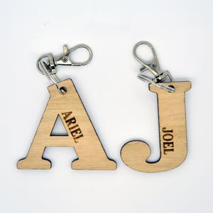 Personalised wooden kids name tags. Laser cut bag tag/ key ring for kids, daycare, preschool, nursery school bag. Custom alphabet key ring image 6