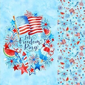 May include: A blue and white fabric with a patriotic theme. The fabric features red, white, and blue stars, fireworks, and American flags. The text "Let Freedom Ring" is printed on the fabric.