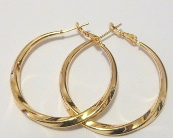 Huge 14 kt yellow gold filled hoop earrings