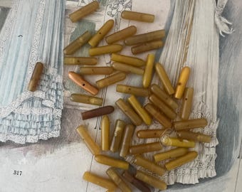 antique celluloid parasol ends.  umbrella tips