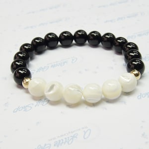 Black Onyx White Mop Mother of Pearl with 14K Gold Beads Stretch Bracelet Jewelry - Fashion Accessory that Perfectly Complements Any Outfit.