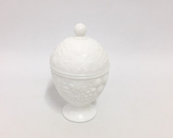 Small vintage milk glass trinket bowl with lid.  Avon collectable.