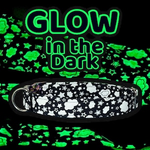 May include: A set of three ceramic mugs with a speckled, matte finish. The mugs are in shades of cream, light gray, and dark gray. Each mug has a simple, minimalist design and a rounded handle. The mugs are stacked on top of each other.