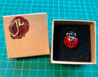 Ladybird pin back badge. Handmade and hand painted.