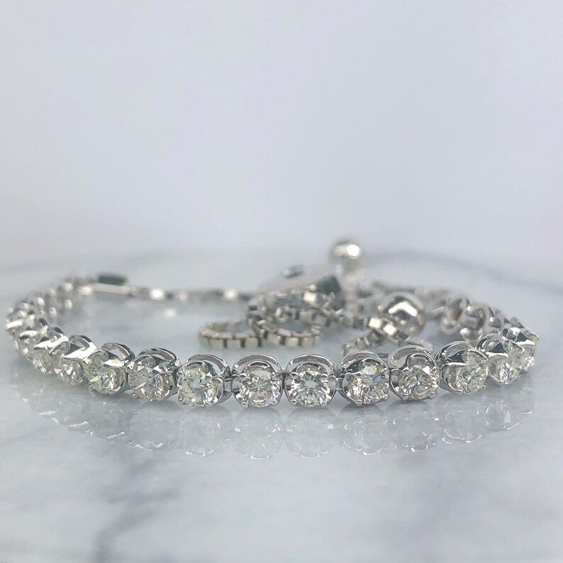 Womens 0.20 Ct Diamond 10k Yellow Gold Floral Bolo Adjustable Bracelet Chain 9/"