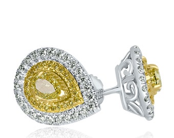 May include: A pair of pear-shaped stud earrings. The earrings have a yellow diamond centre, surrounded by a halo of smaller white diamonds. The setting is a mix of white and yellow gold.