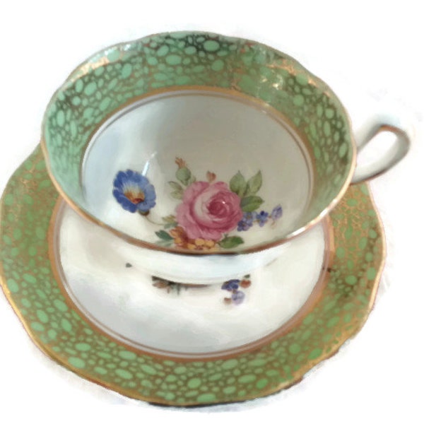 Breathtaking vintage Phoenix China T.F. & S. Ltd. footed tea cup and saucer with light sage green band, gold details and dainty flowers