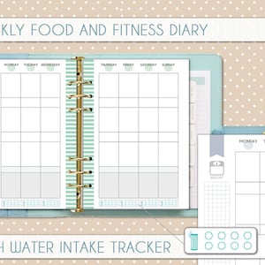 May include: A weekly food and fitness diary with a water intake tracker. The diary has a light blue cover with a gold binder. The pages are divided into sections for each day of the week. The water intake tracker has a light blue glass with eight circles.
