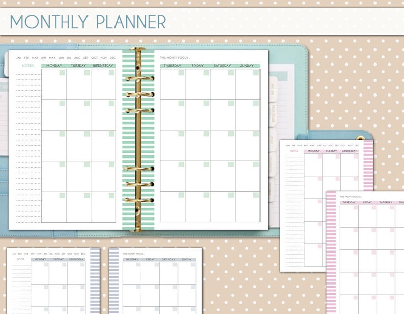 May include: A monthly planner with a green and white striped cover. The planner has a ring binder and includes pages for notes, a monthly calendar, and a weekly calendar.