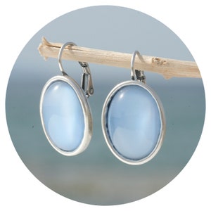 artjany earrings light blue cabochons oval silver