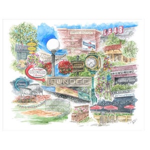 May include: A watercolor painting of a small town square with various shops and businesses. The painting features a clock tower, a park bench, a baseball field, and a variety of flowers and plants. The text "Dundee" is prominently displayed on a sign.