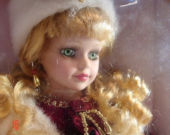 Sabrina Porcelain Doll in box - Blond hair, Green eyes 16 tall, Very Good Condition, Burgundy Dress, with Stand -