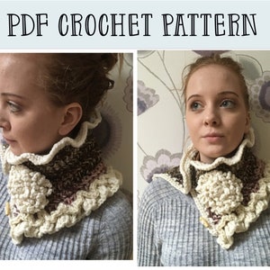 May include: A crocheted neck warmer with a ruffled edge and a large flower design in the centre. The neck warmer is made in a cream colour with brown and pink accents.
