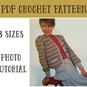 May include: A crochet cardigan pattern in PDF format with a photo tutorial. The pattern includes three sizes. The image shows a woman wearing a striped cardigan in green, red, and white.
