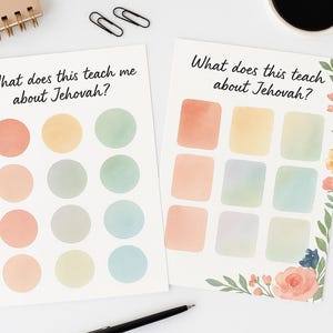 May include: Two watercolor-style worksheets with the text "What does this teach me about Jehovah?" One features circles, the other squares, in pastel colors. Pens, pencils, a notepad, paperclips, and a coffee cup are also visible.