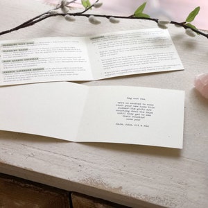 May include: A white card with a handwritten message that reads "Meg and Tim, we are so excited to come visit your new home this summer! The girls are counting down the days until they get to see their cousins! Love you! Sara, John, Ali & Mae."