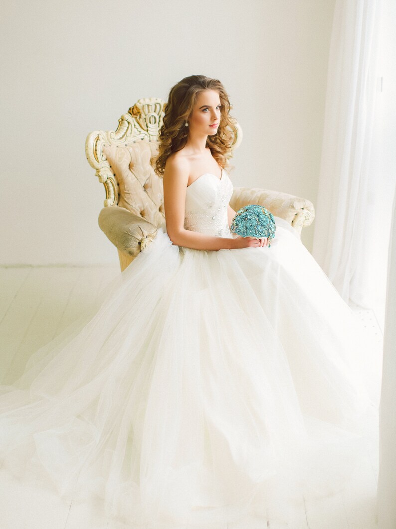 Turquoise Brooch On Wedding Dress