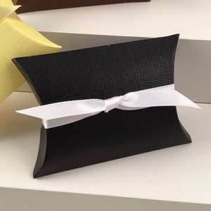 Black pillow box for favors.