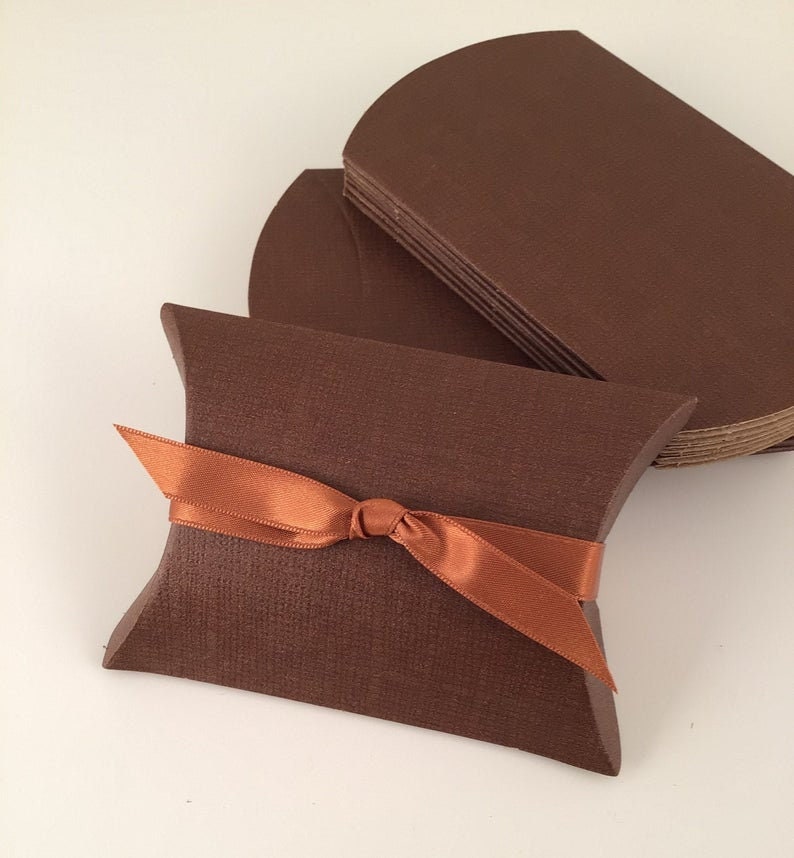 Chocolate brown pillow box for favors.