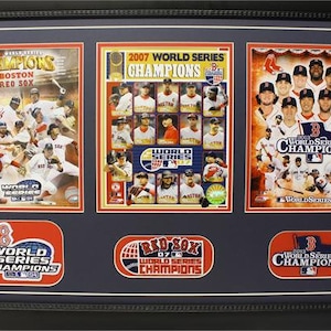 May include: A framed collage of three photos celebrating the 2007 Boston Red Sox World Series Championship. The photos feature the team's players and the text "2007 World Series Champions".