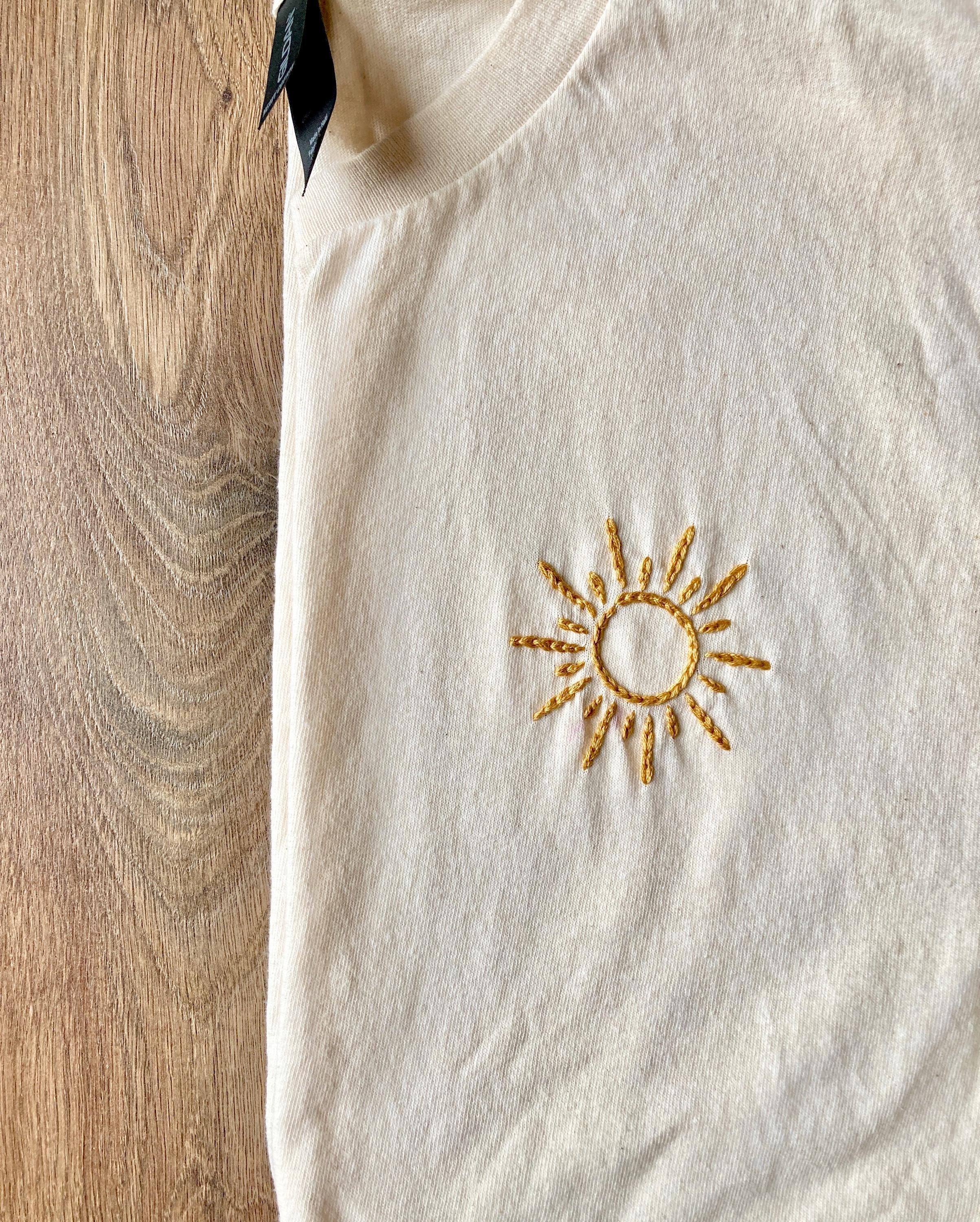Sun Hum Golden Sun Tee | Hand Embroidered Sun Design | Gold Thread Sunburst ...
