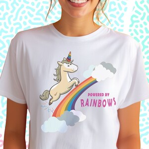 Powered by Rainbows- Unisex Jersey Short Sleeve, Whimsical-tee, Playful Unicorn T-shirt, Quirky T-Shirt, Pride T-Shirt, Birthday Gift