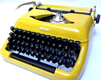 Yellow Biser typewriter