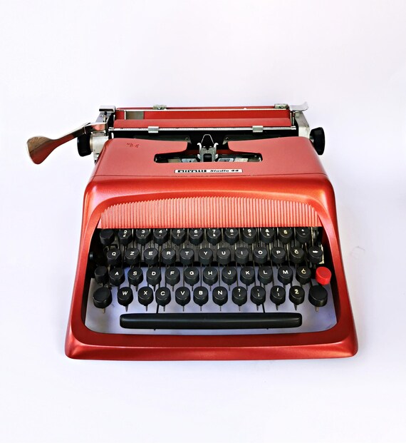 Olivetti 112タイプライター 赤 ヴィンテージメタリックマルーンのOlivetti Studio 44タイプライター