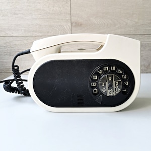 Vintage rotary wall phone made in Yugoslavia