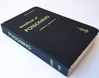 Vintage black handbook on Poisoning
