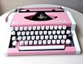 Pink UNIS typewriter made in Yugoslavia product logo