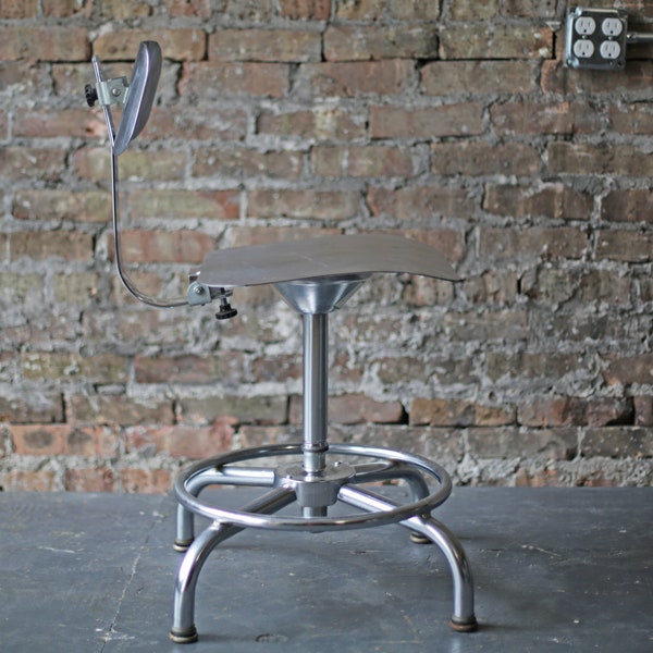 vintage steel drafting stool by Ajusto Equipment Co., American industrial scalable for desk or drafting table