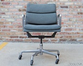 vintage management chair from the Eames Soft Pad line an extension of the Aluminum Group by Charles and Ray Eames