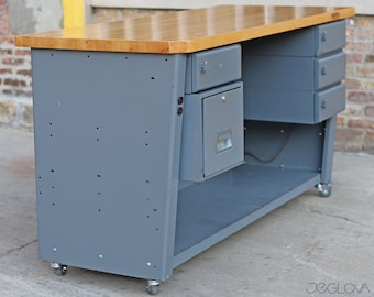 industrial steel base butcher block top workbench by Equipto with extra power outlets and storage