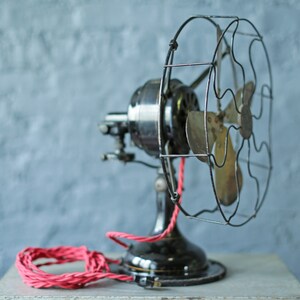 vintage oscillating cast iron base and brass blade fan by Robbins and Myers Co, circa 1920 image 2