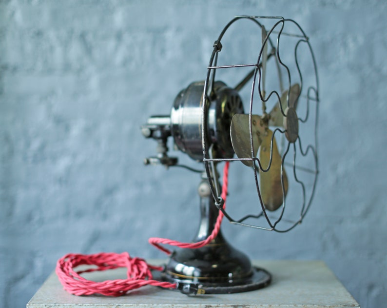 vintage oscillating cast iron base and brass blade fan by Robbins and Myers Co, circa 1920 image 2