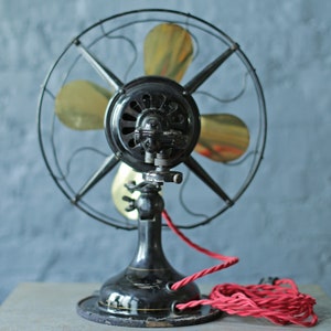 vintage oscillating cast iron base and brass blade fan by Robbins and Myers Co, circa 1920 image 5